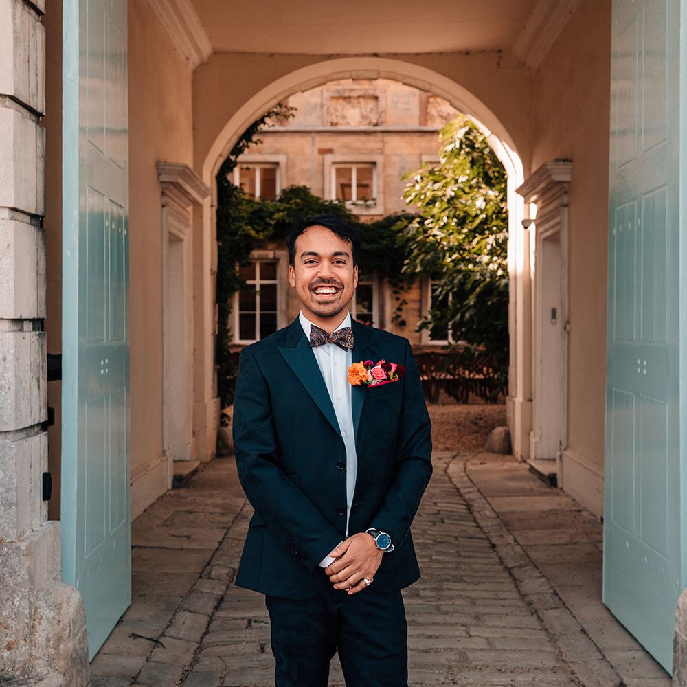 groom-in-dark-wedding-suit