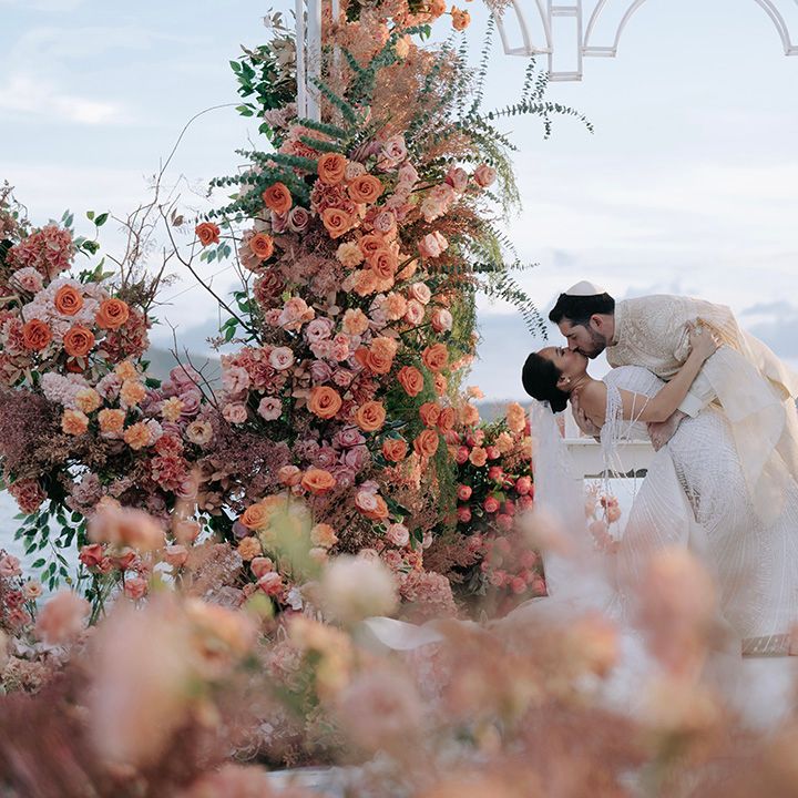 first-kiss-for-bride-and-groom-as-married-couple
