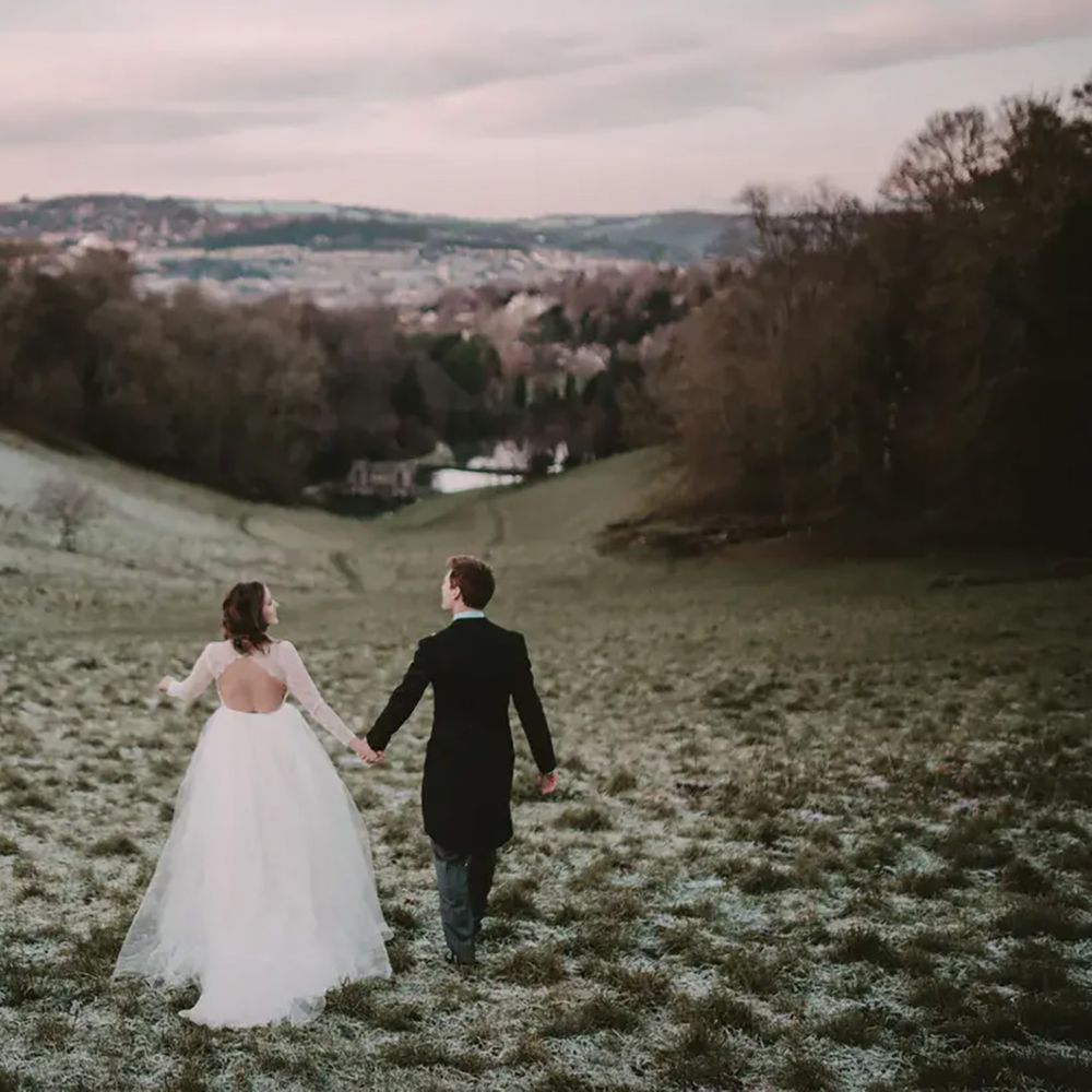 Prior Park College Bath wedding venue scenic view with couple on wedding day