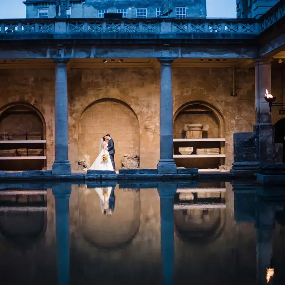 Wedding ceremony for couple at the Roman Baths and Pump Room Bath wedding venue 