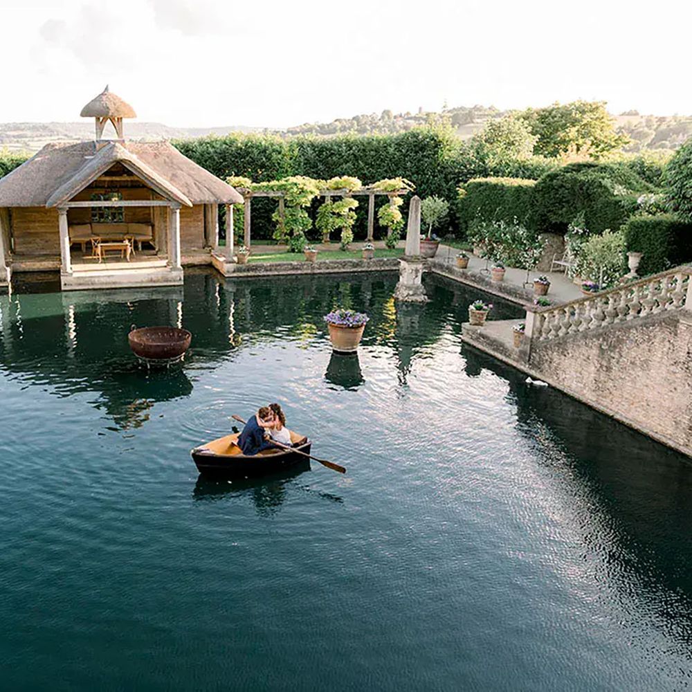 Euridge Manor Bath wedding venue water feature and thatched boathouse