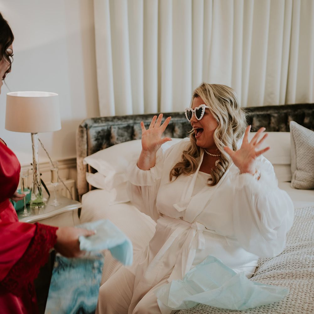 bride-wearing-tulle-robe-and-sunglasses