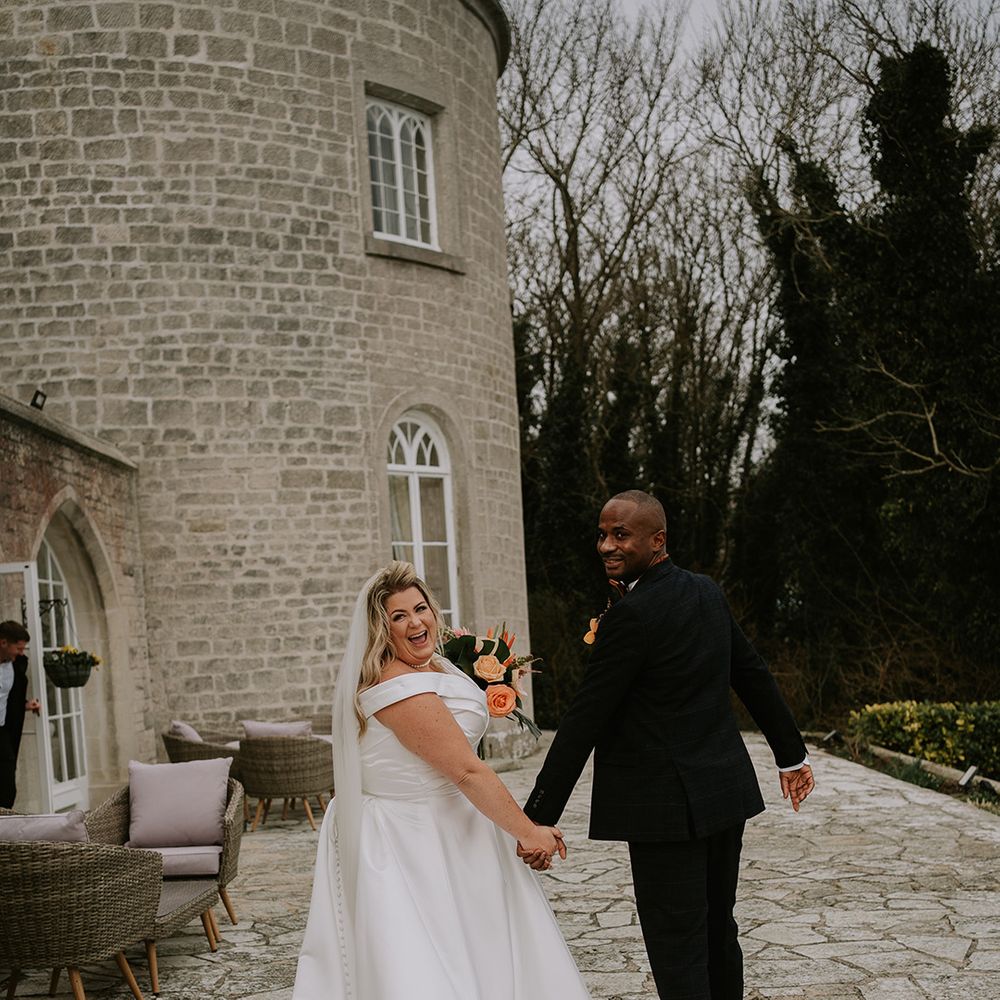 happy-couple-exit-their-ceremony-at-pennsylvania-castle-estate