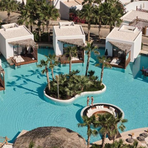Overhead view of pool, loungers and swim up rooms