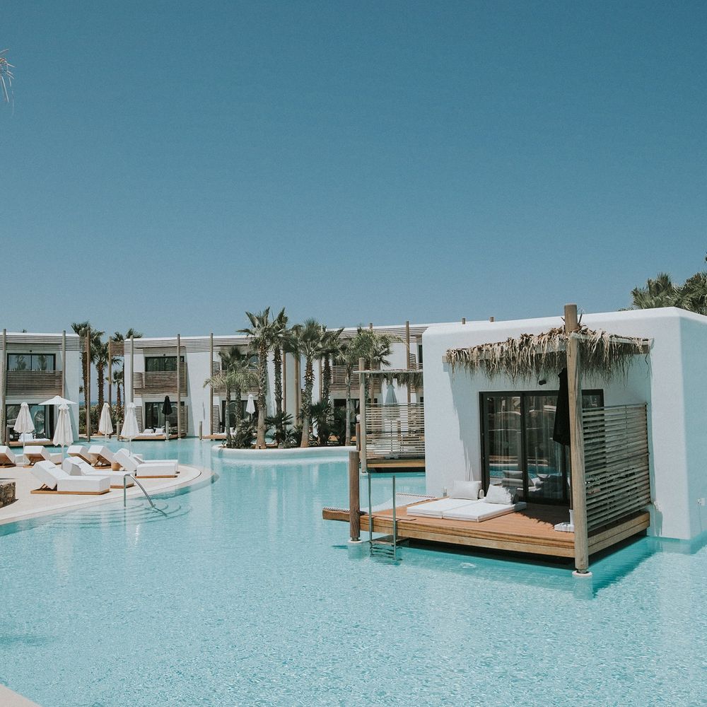 Stella Island pool with swim up rooms 