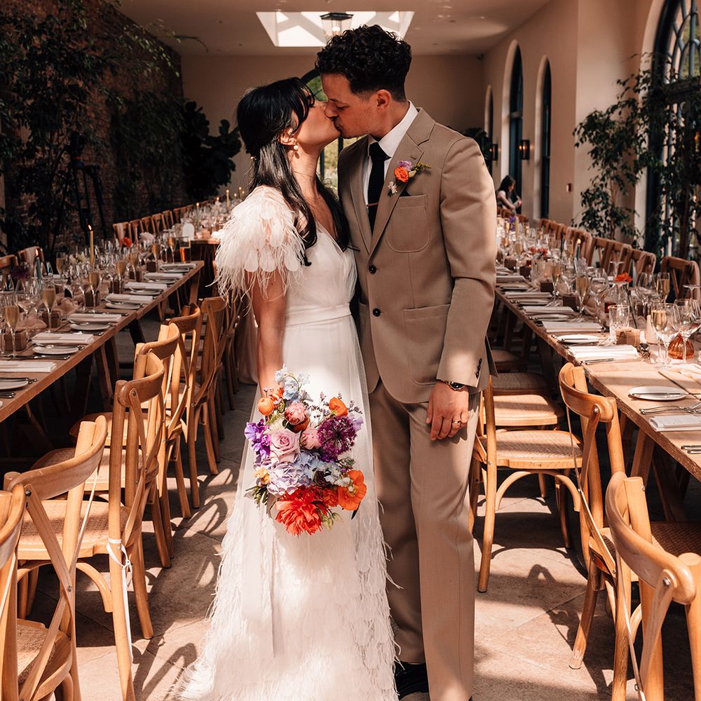 couple-share-a-kiss-at-middleton-lodge-wedding