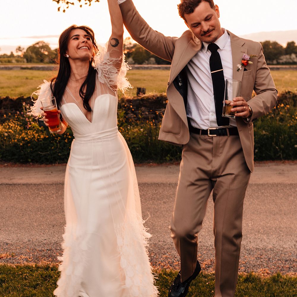 golden-hour-photo-of-couple-dancing-happy-together