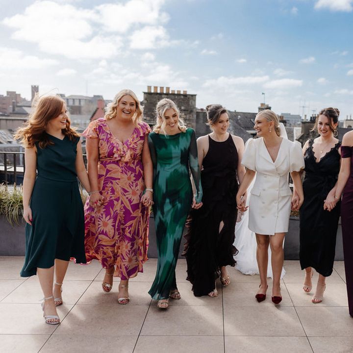 bride-poses-with-wedding-guests-at-virgin-hotels-edinburgh