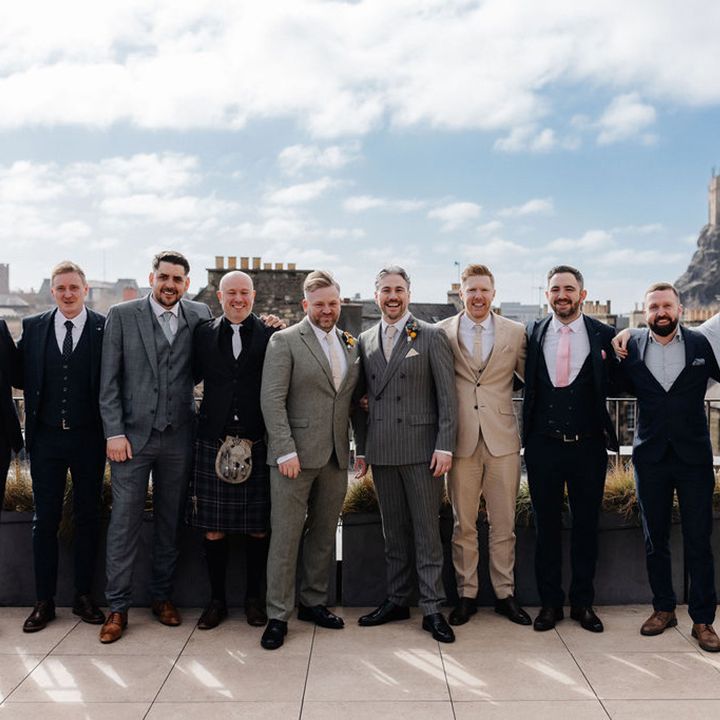 groom-with-wedding-guests-for-edinburgh-wedding