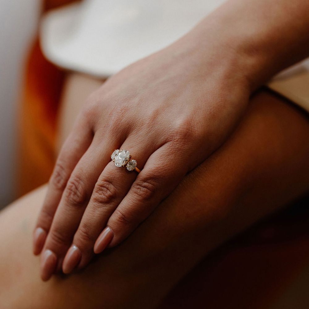 trinity-stone-diamond-engagement-ring-on-gold-band