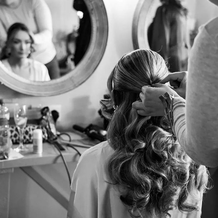 Bride Wearing Hair in Half Up Half Down Wedding Hairstyle