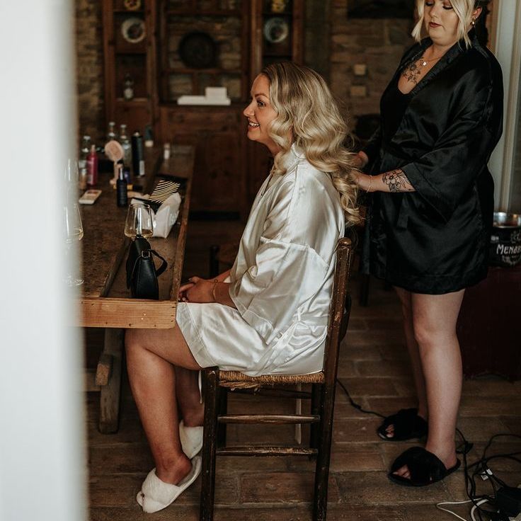 Bride in Satin Robe Gets Hair Styled For Wedding Day