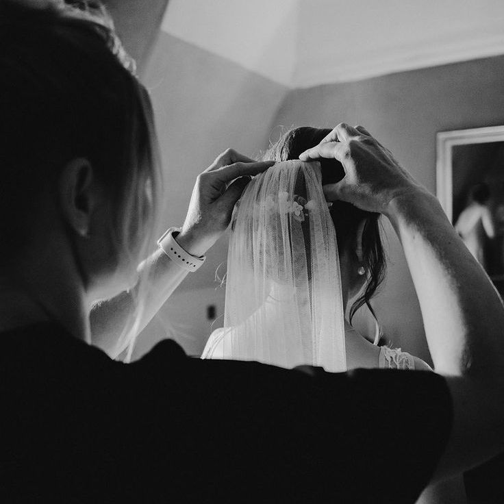 Bride Gets Veil Put on Bun Wedding Hair For Rustic Castle Wedding