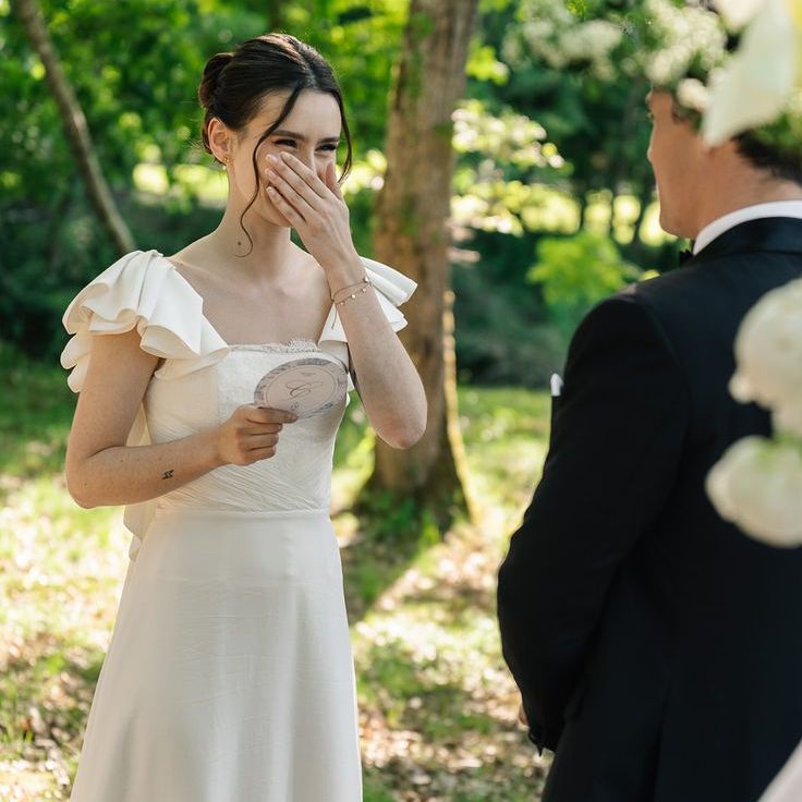 Bride's Emotional Reaction To Reading Her Wedding Vows at Outdoor Wedding Ceremony