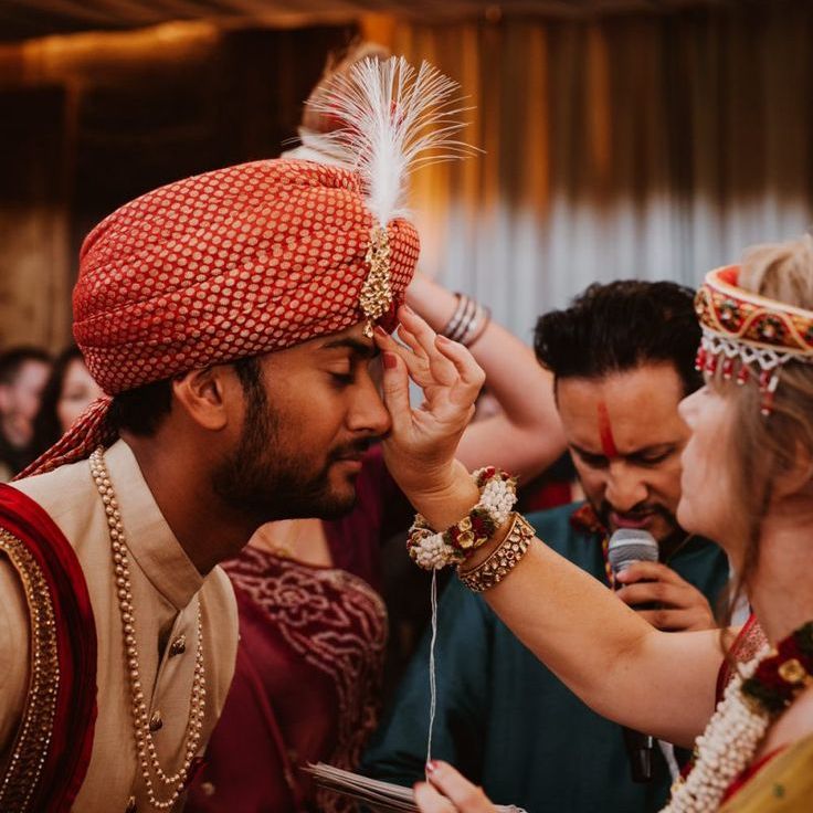 Traditional Hindu Wedding Ceremony with Groom in Traditional Outfit