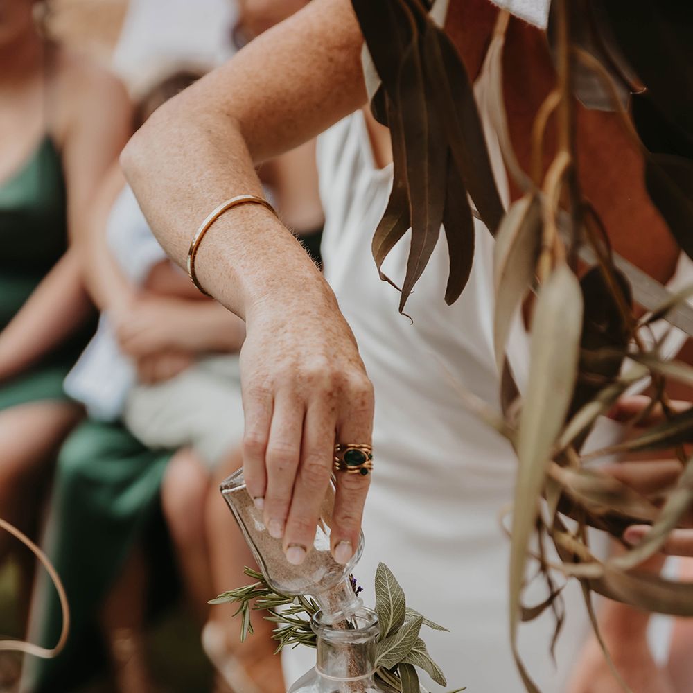 sand-pouring-wedding-ceremony-at-same-sex-wedding