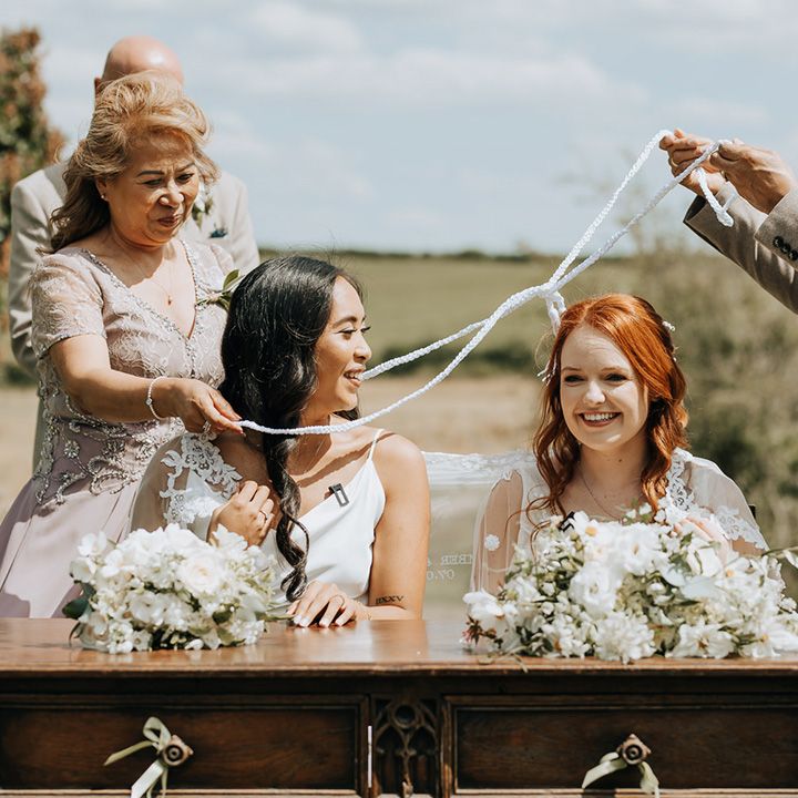 Unique unity veil and cord wedding tradition for Filipino wedding