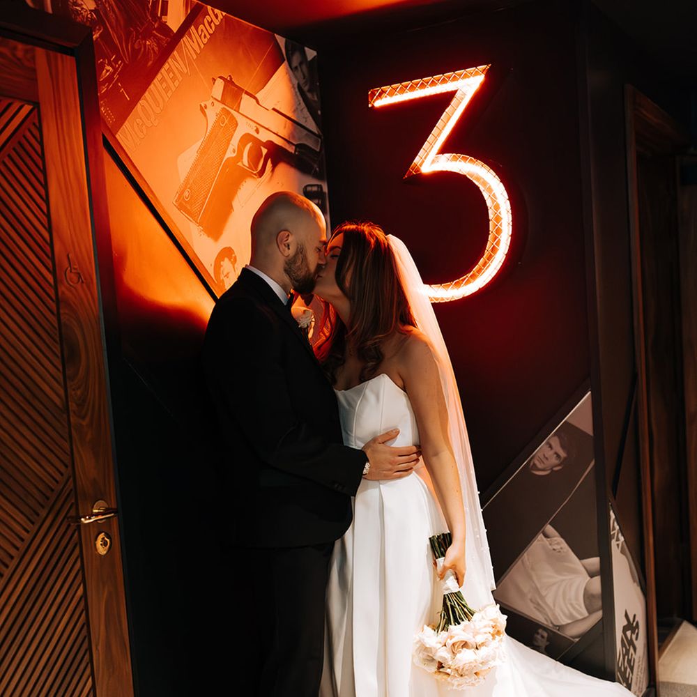 bride-and-groom-outside-cinema-room-door