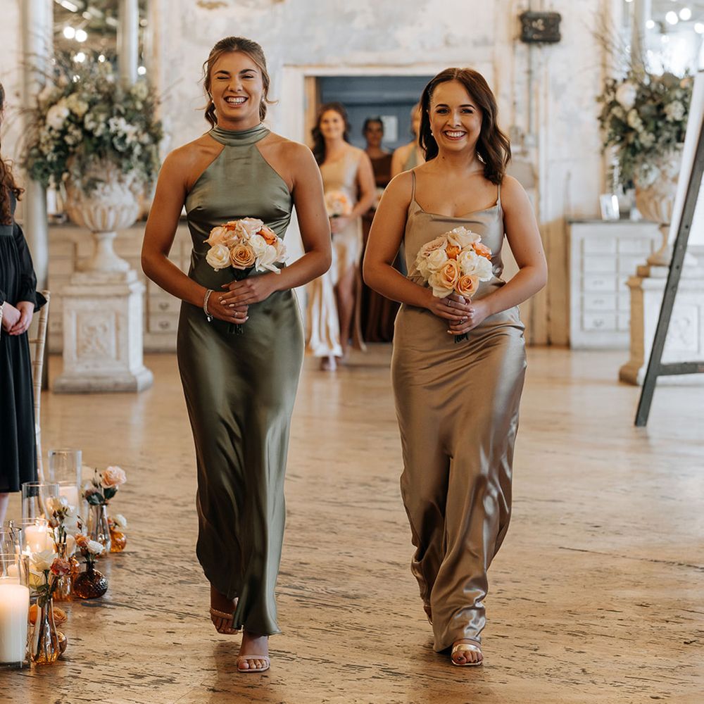 bridesmaids-wearing-satin-green-bridesmaid-dresses
