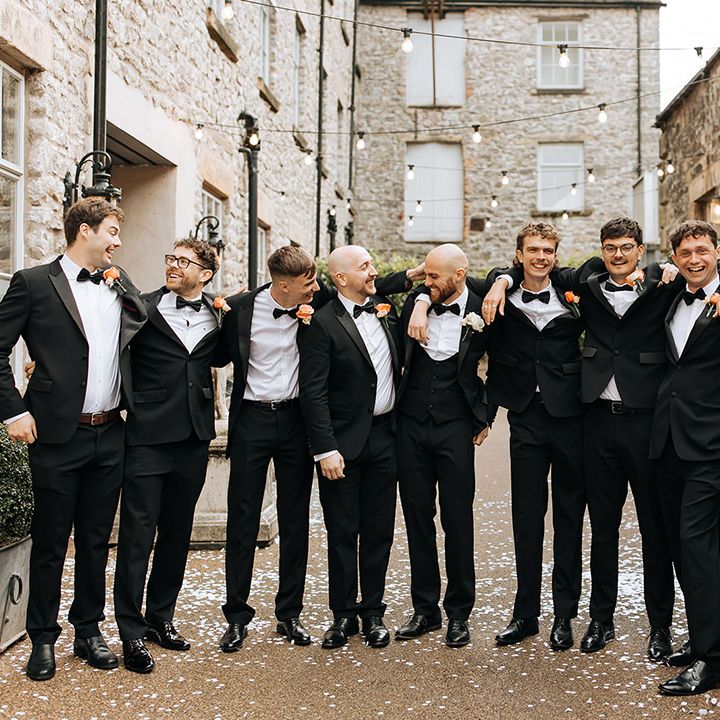 groomsmen-wearing-black-tuxedos