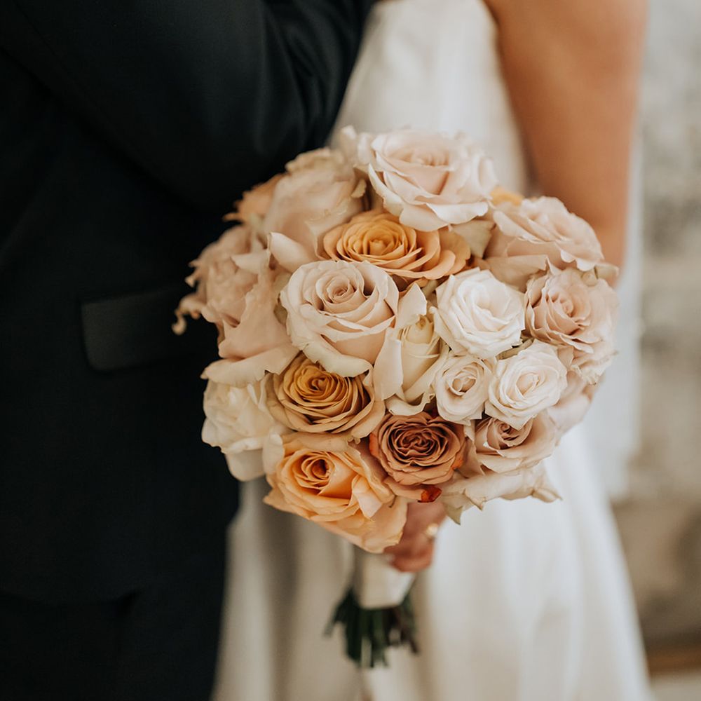 round-peach-and-neutral-tone-rose-wedding-bouquet