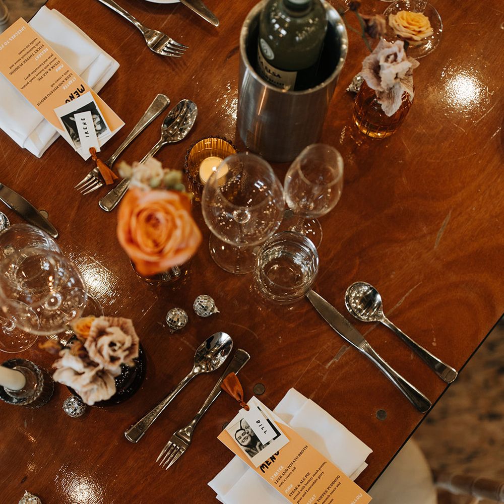 simple-wedding-place-setting-with-orange-decor-and-details