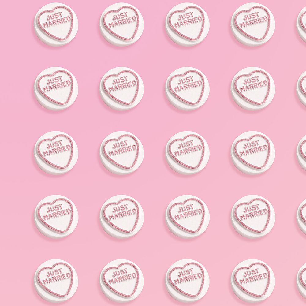 Love Hearts "Just Married" Swizzels sweet graphic on a pink background