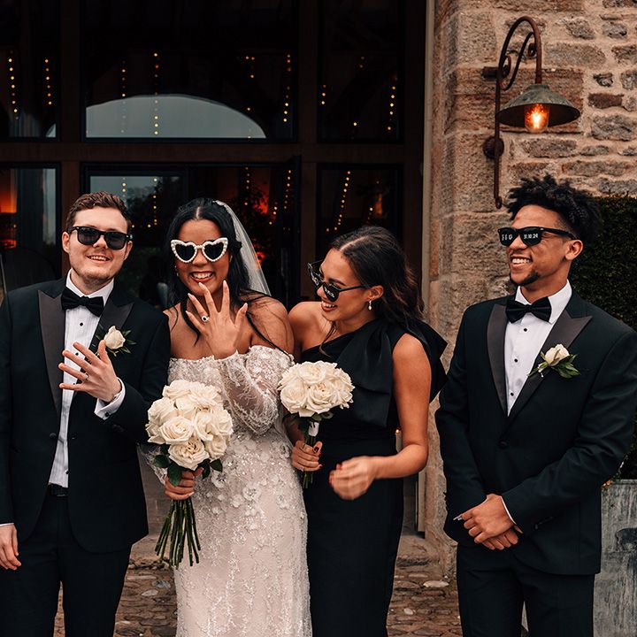 black-tie-dress-code-for-wedding-guests-with-black-sunglasses