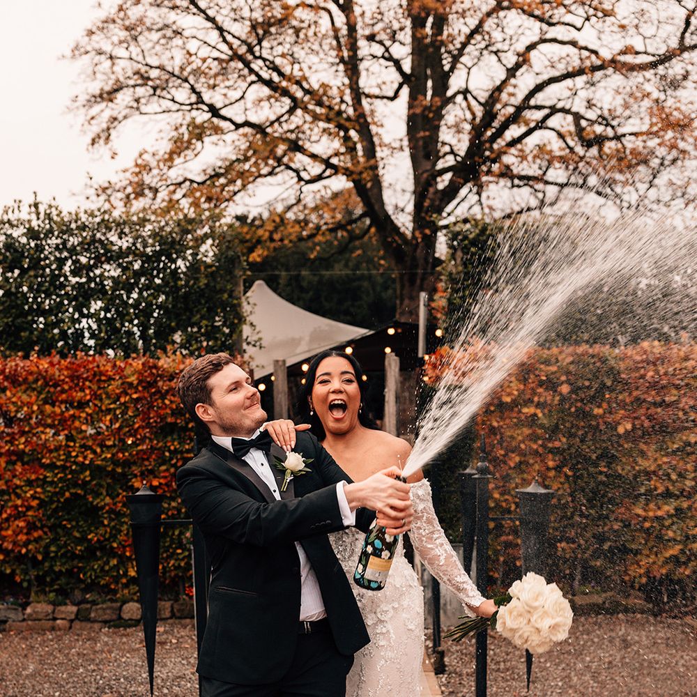 champagne-spray-couple-photo