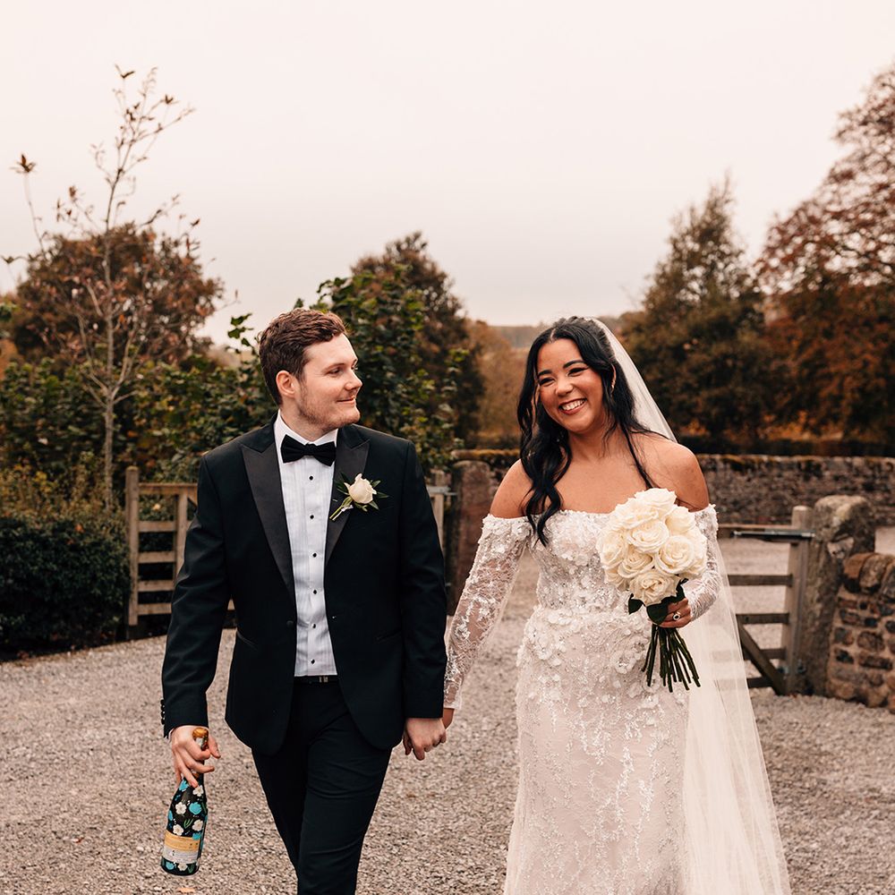 groom-in-black-tuxedo-with-bride-in-embellished-sparkly-wedding-dress