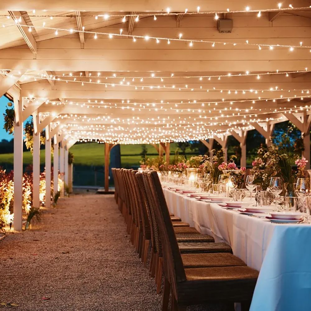 Wedding reception under pergola at Brinsop Court, sustainable wedding venue