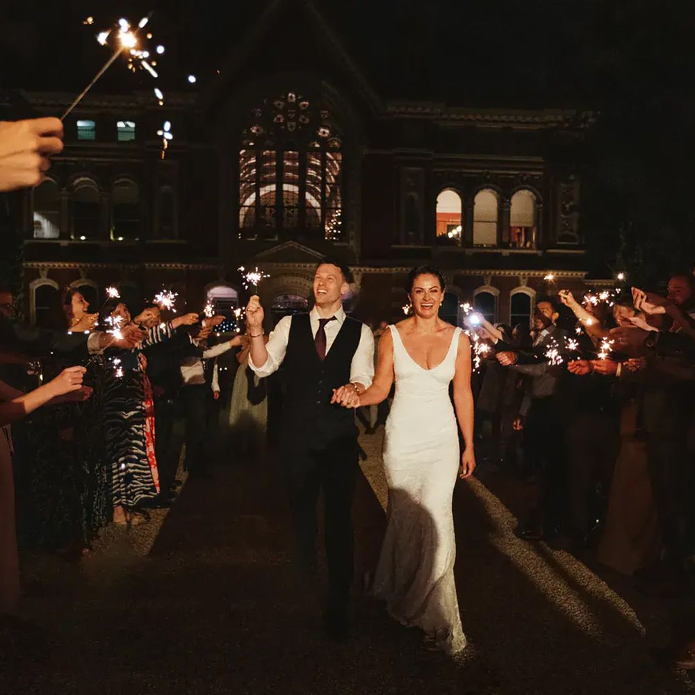 Sparkler exit moment at sustainable wedding venue, Dulwich College