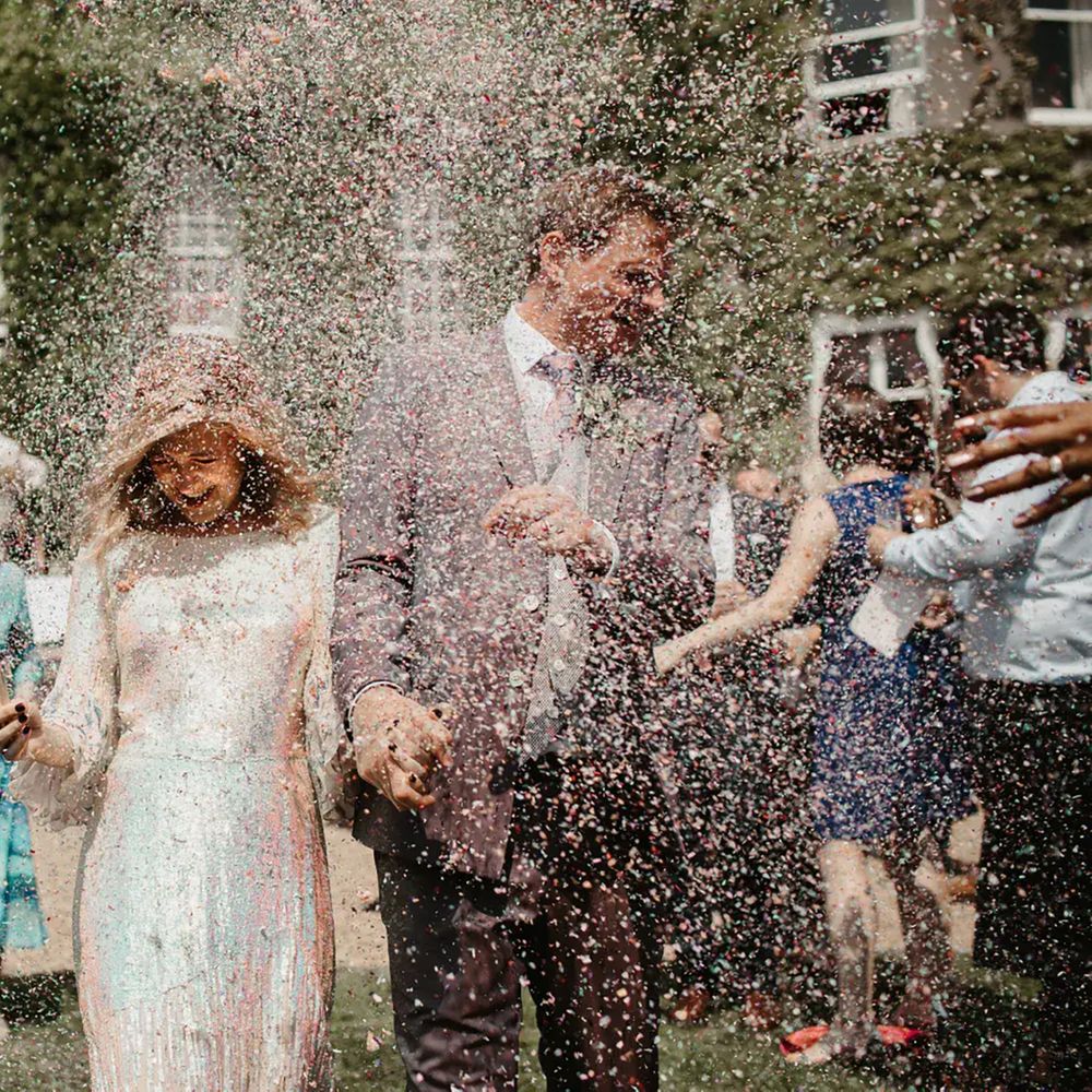 Pennard House sustainable wedding venue, couple's confetti moment