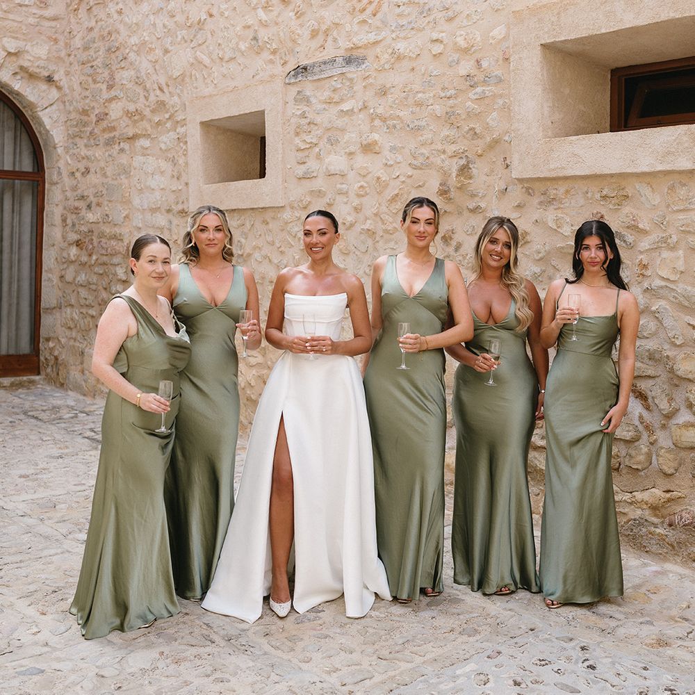 bridal-party-wearing-green-satin-bridesmaid-dresses