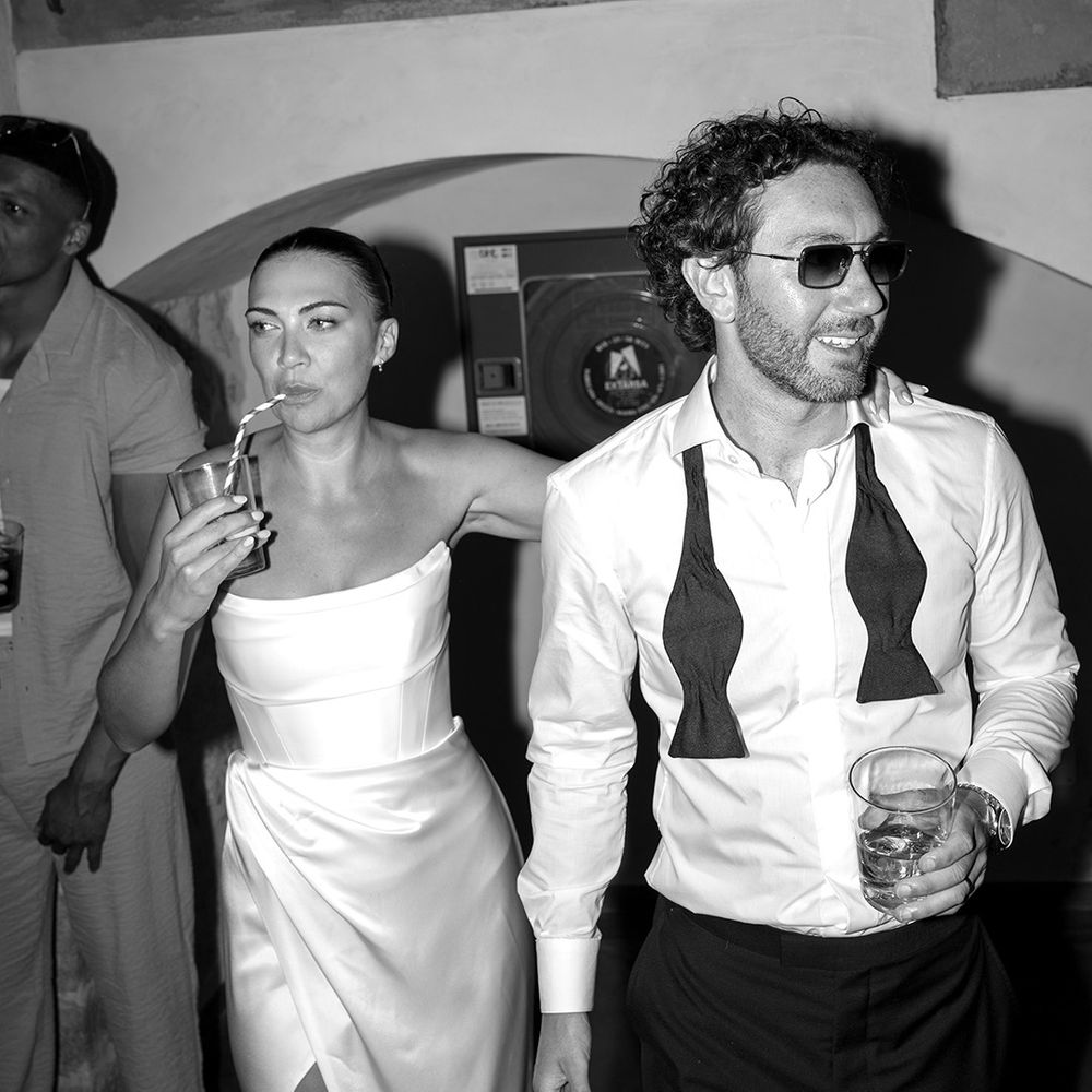 bride-and-groom-drinking-at-their-wedding-party