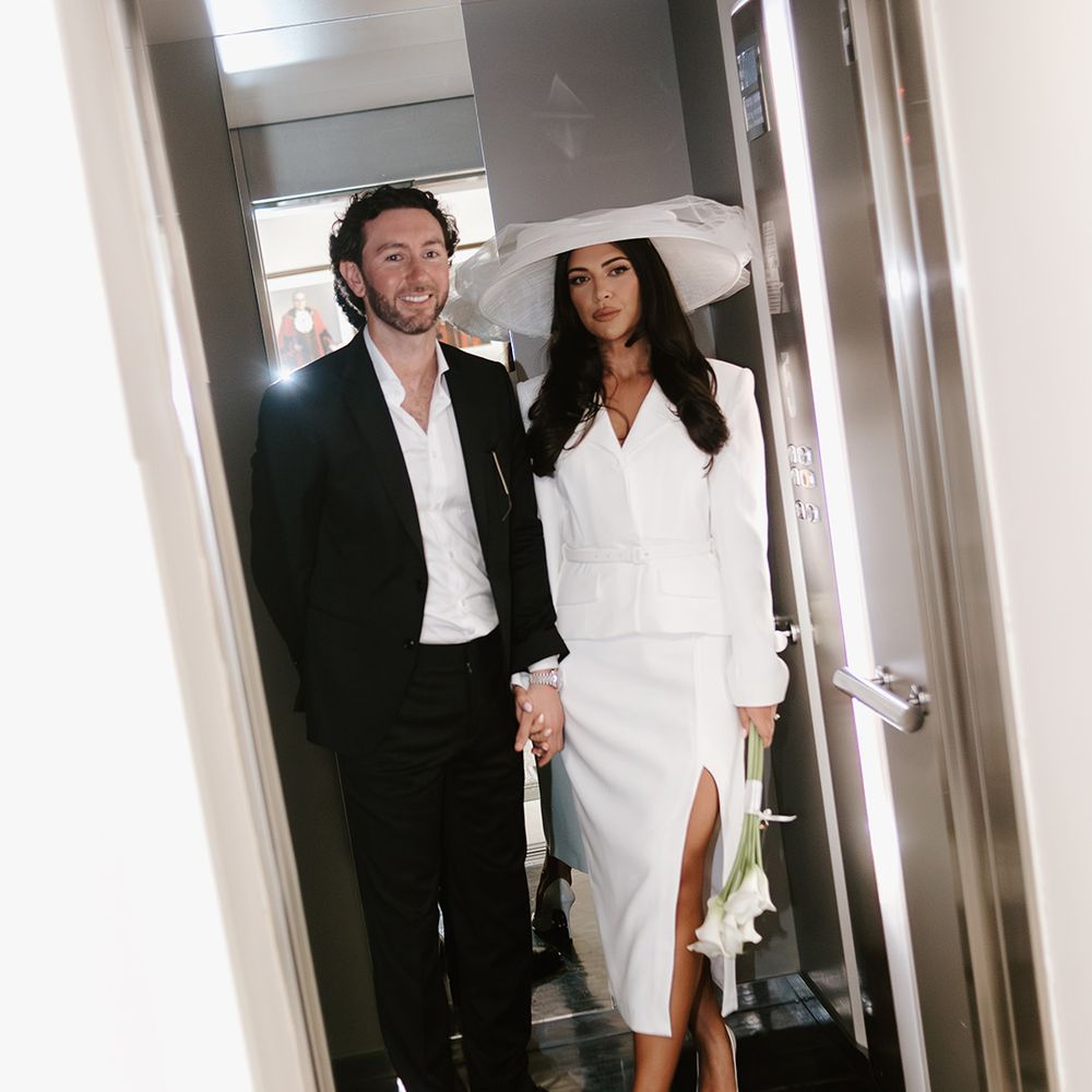 bride-and-groom-in-lift-for-couple-photo