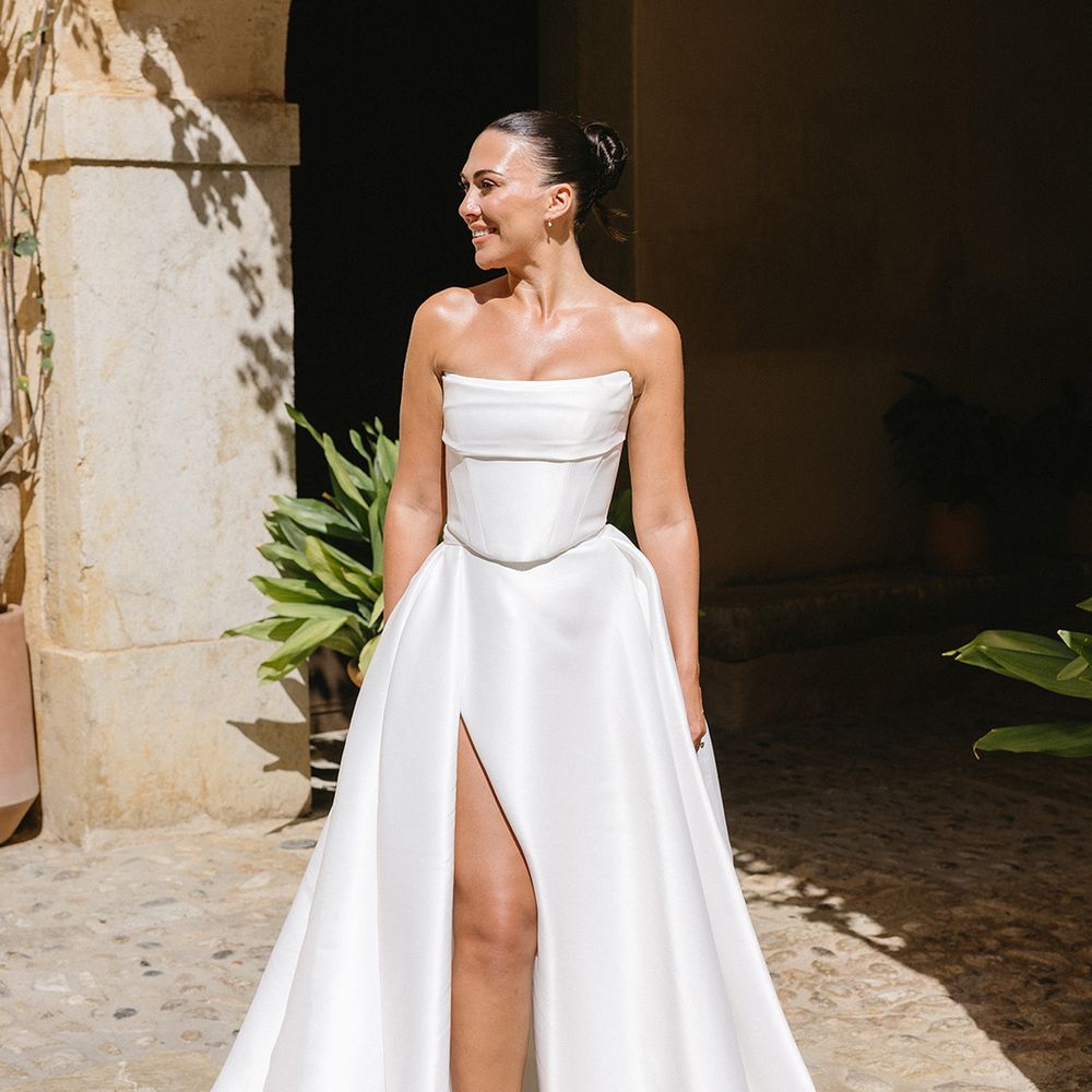 bride-in-corset-wedding-dress-with-front-slit