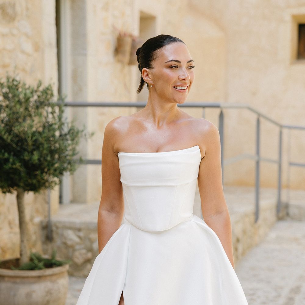 bride-in-strapless-wedding-dress-with-front-slit