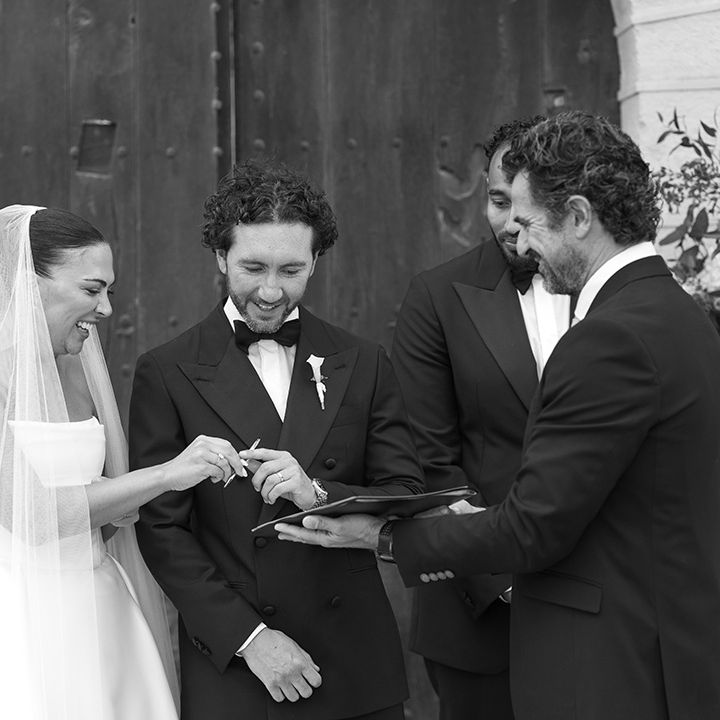 couple-sign-the-wedding-register