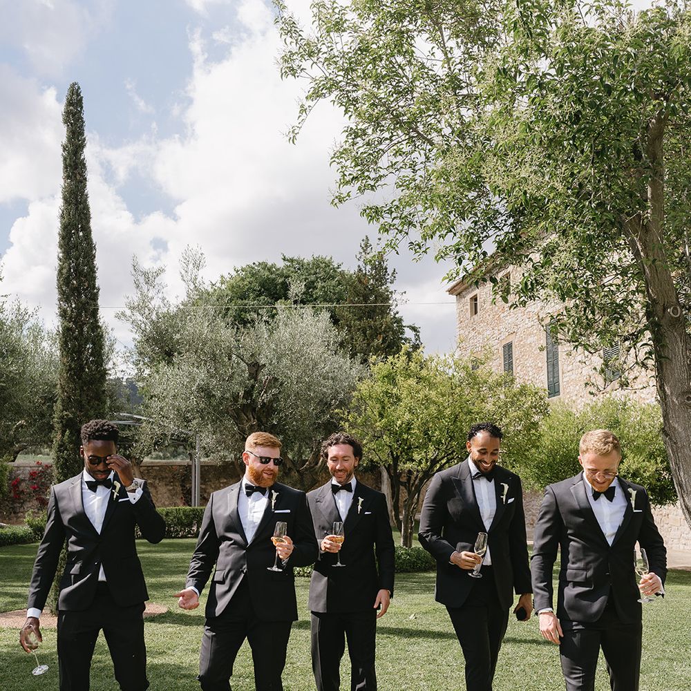 groomsmen-in-black-tuxedo-at-destination-wedding