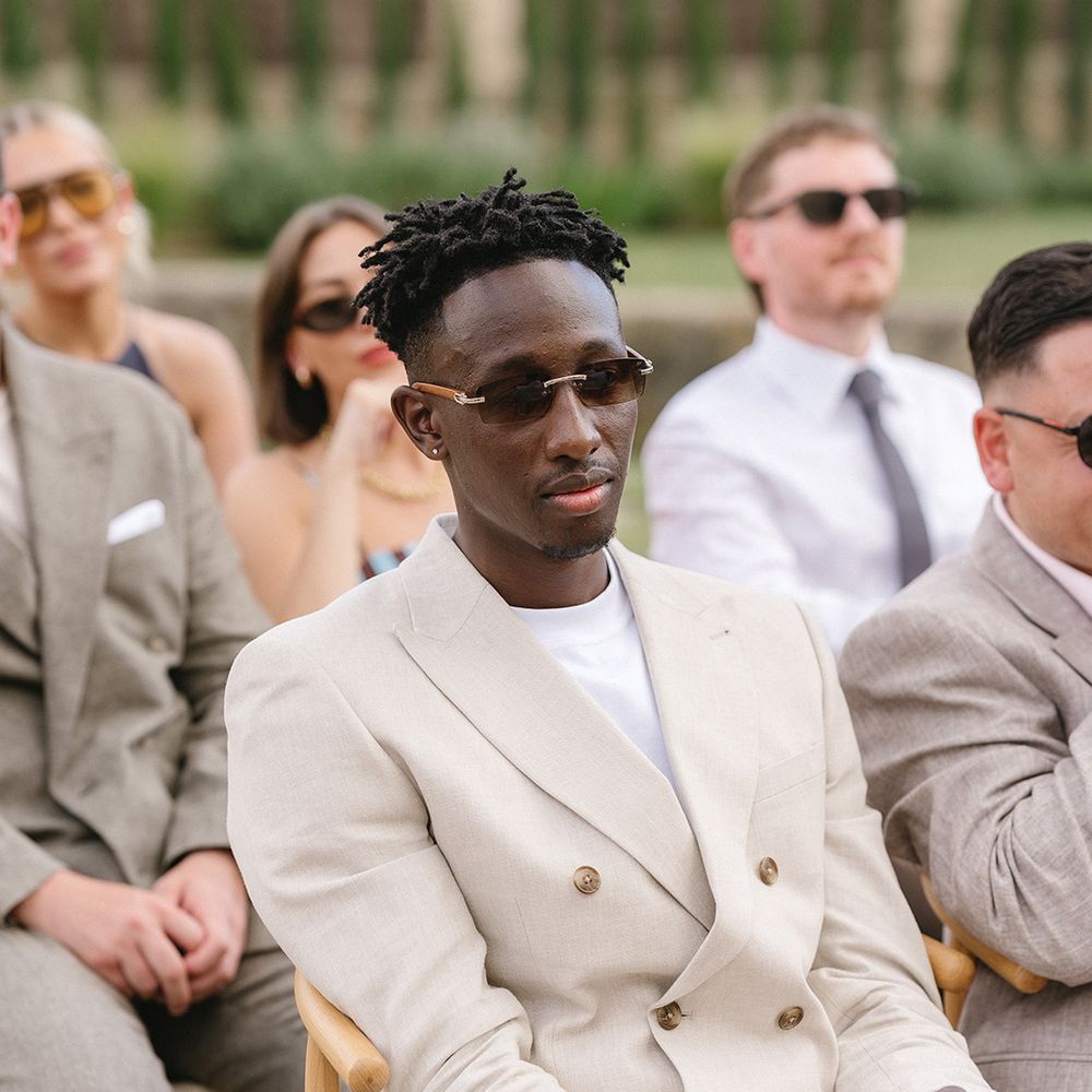 wedding-guest-in-stylish-cream-double-breasted-suit