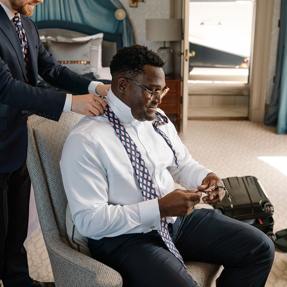groom-gets-ready-for-wedding-with-patterned-tie