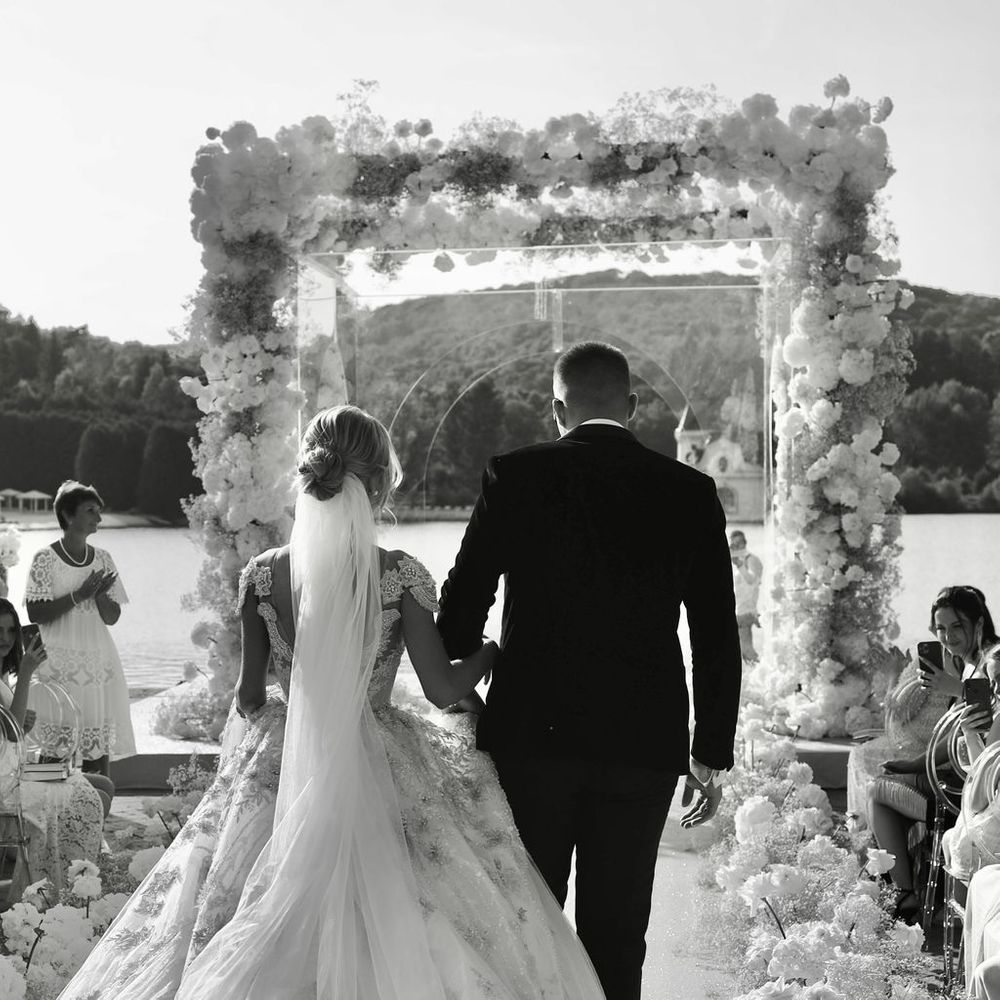 bride-and-groom-walk-down-the-aisle-at-outdoor-wedding