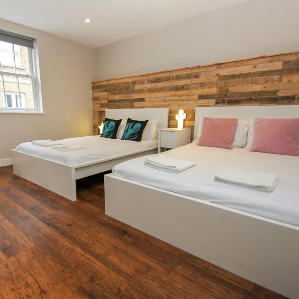 Steine House Brighton hen party house group bedroom with two double beds