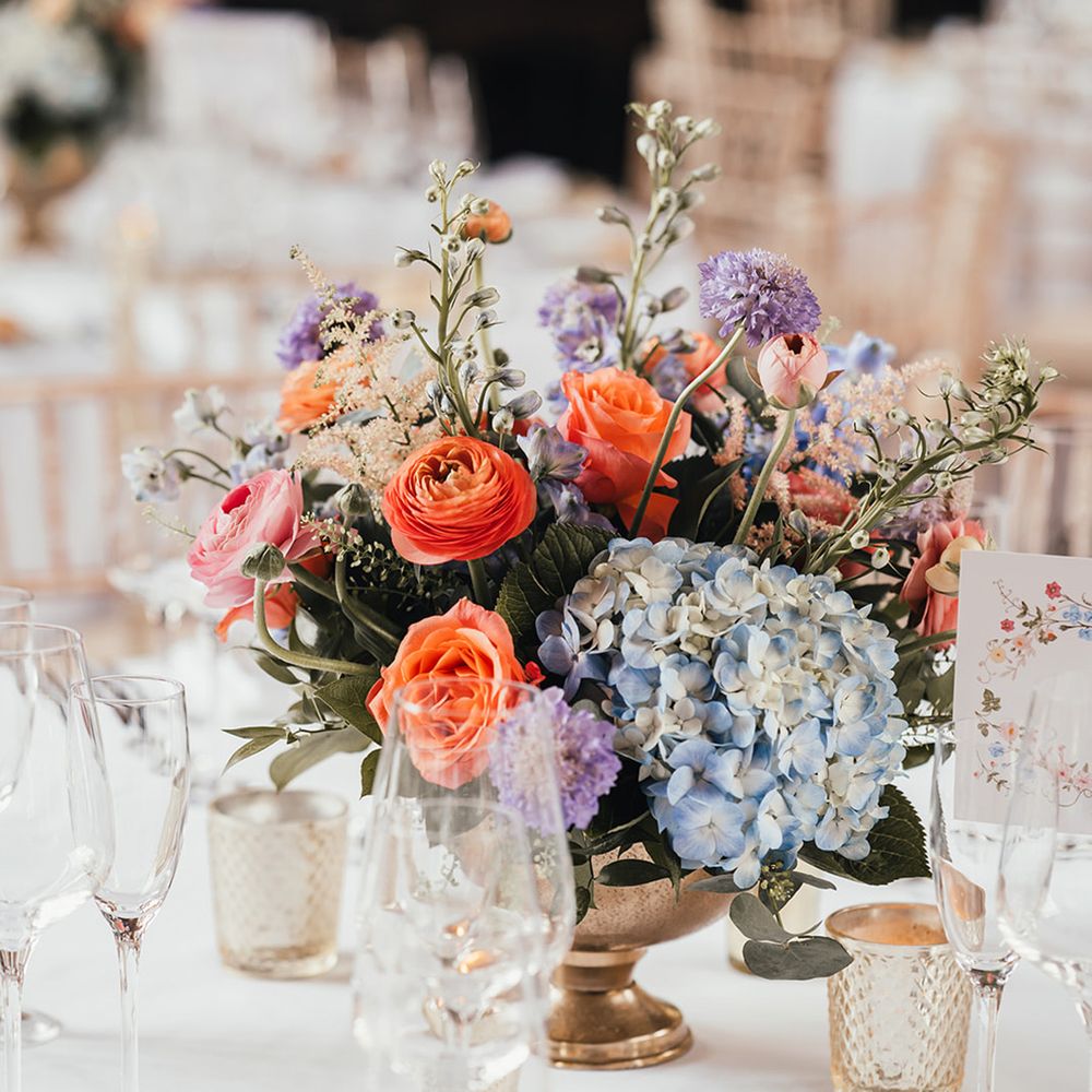 blue-purple-and-coral-floral-centrepiece