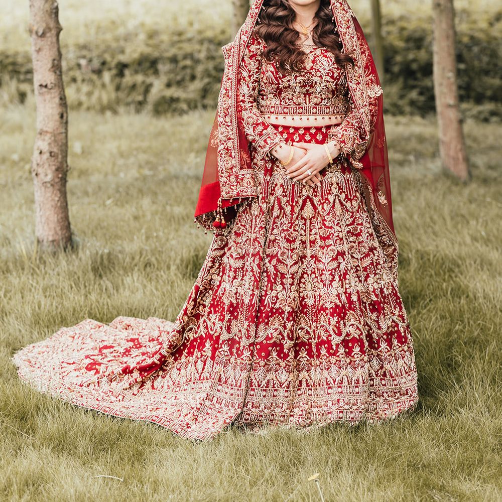 bride-in-red-gold-lehenga