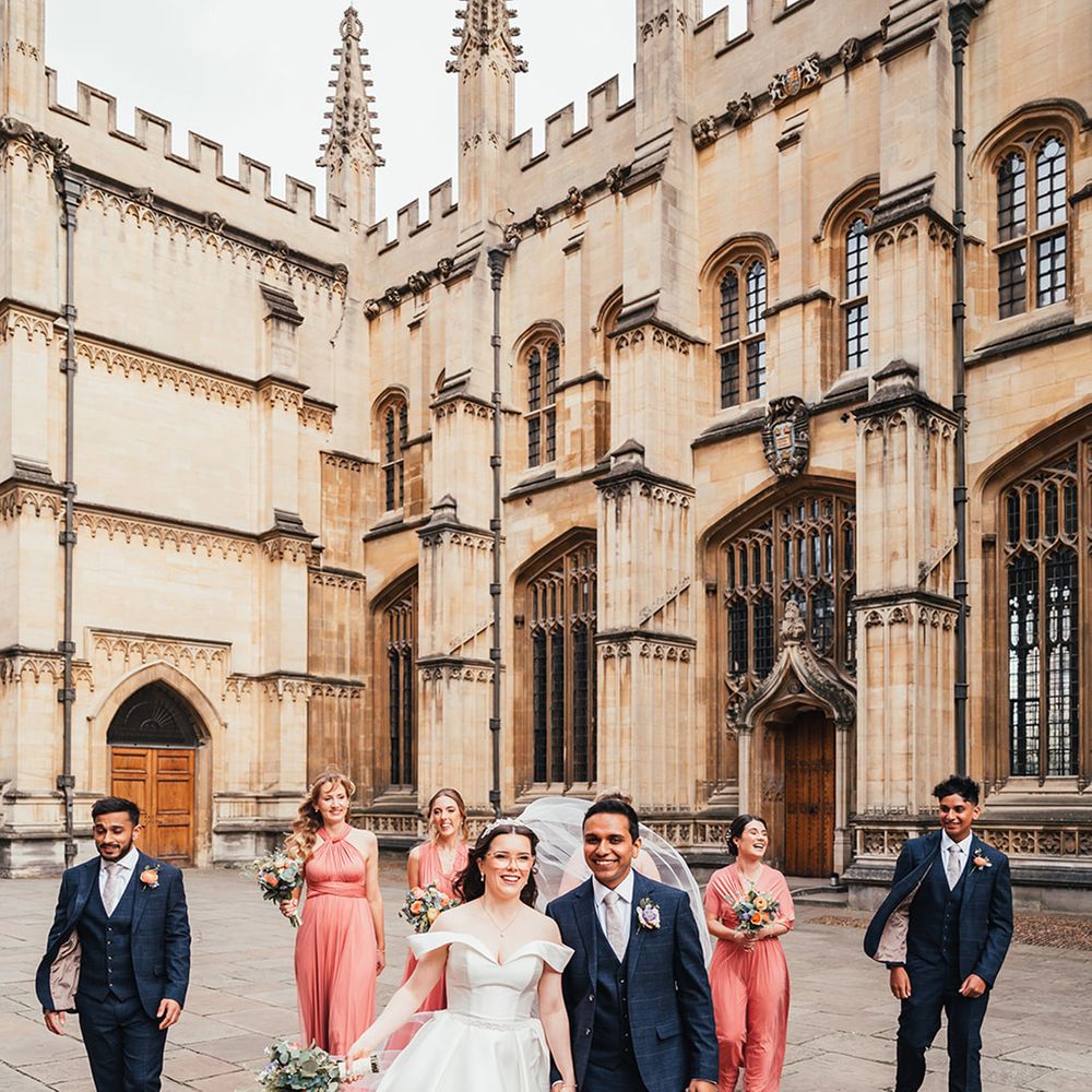 wedding-party-walking-around-historic-wedding-venue