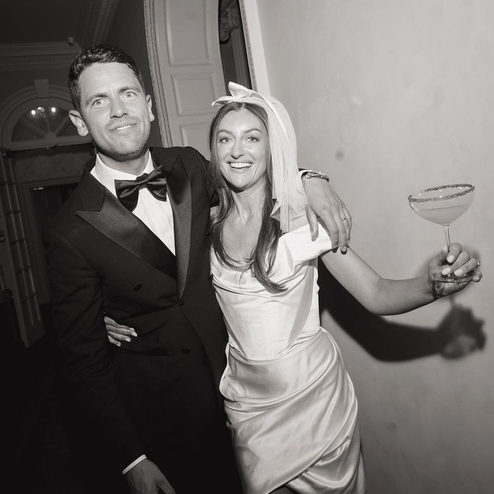 bride-drinking-cocktail-with-groom-for-wedding-reception