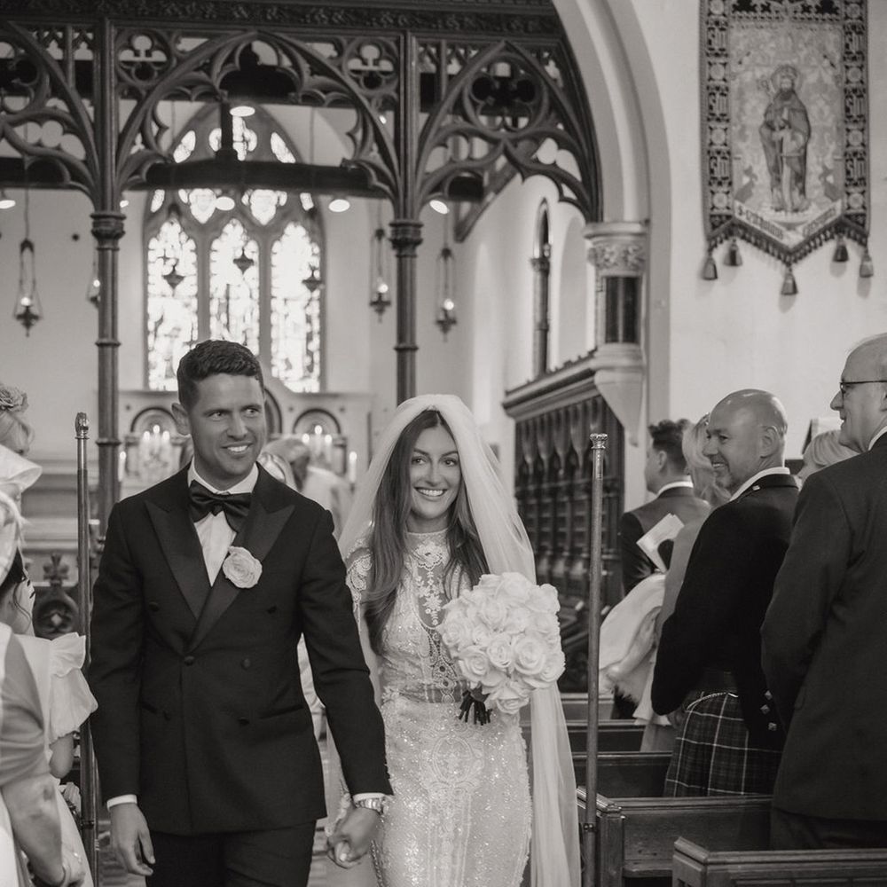 couple-walks-back-down-the-aisle-as-married-couple