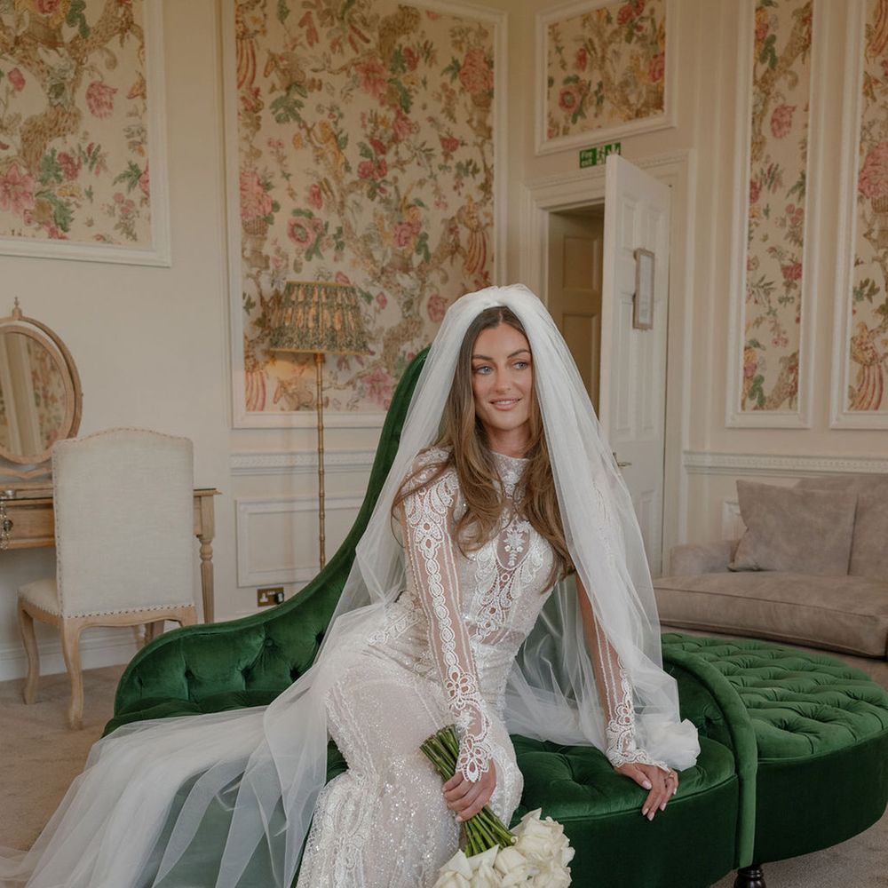 Gala 805 Galia Lahav wedding gown with veil and white rose bouquet